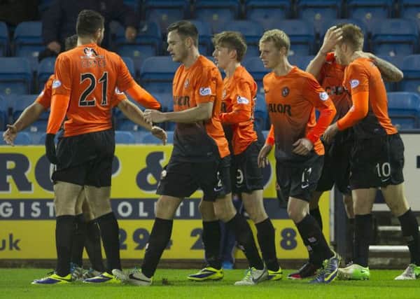 Dundee Utd's Stuart Armstrong (right) celebrates his goal with his team-mates. Picture: SNS
