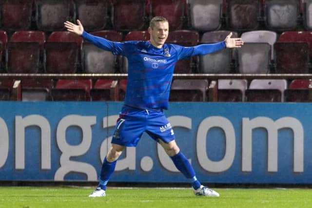 Billy McKay celebrates his second goal. Picture: SNS