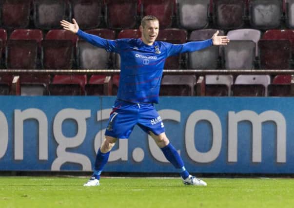 Billy McKay celebrates his second goal. Picture: SNS