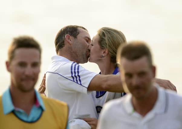 Sergio Garcia kisses girlfriend Katharina Boehm. Picture: Getty