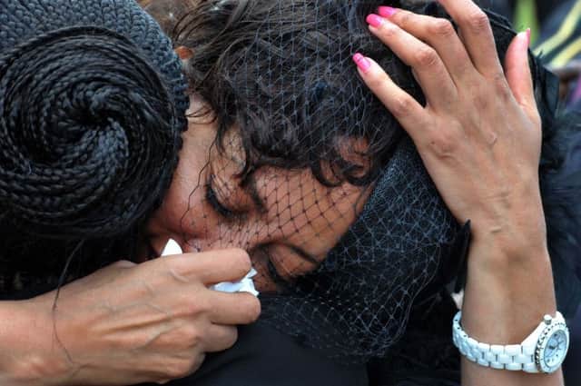 Lindiwe Sisulu, a South African politician, is overcome with emotion. Picture: AP
