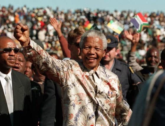 Nelson Mandela at an election rally in 1999. Picture: AP