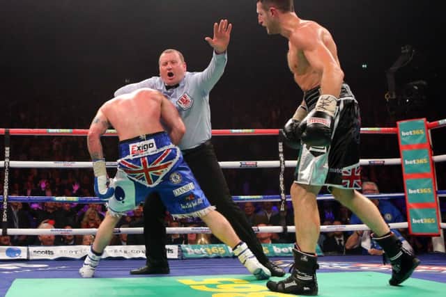 Howard Foster stops last months encounter between Carl Froch, right, and George Groves. Picture: PA