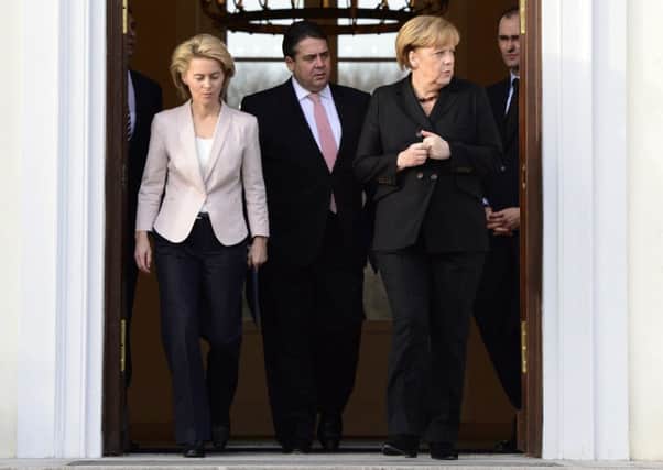 Ursula von der Leyen, German Vice Chancellor Sigmar Gabriel and Angela Merkel. Picture: Getty