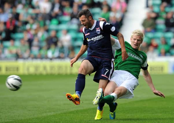 Ivan Sproule in action for Ross County against former club Hibernian. Picture: Ian Rutherford