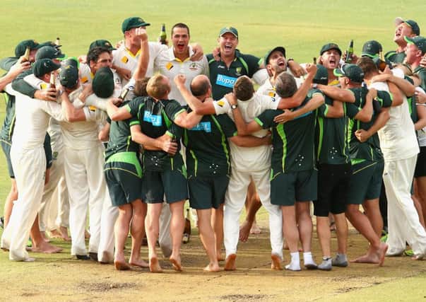 The Australians get a rousing rendition of the team song under way at the WACA. Picture: Getty
