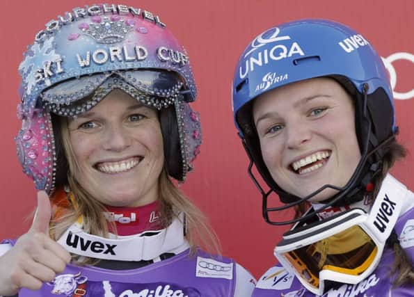 Sisters Marlies (left) and Bernadette Schild are all smiles after the World Cup slalom. Picture: Reuters