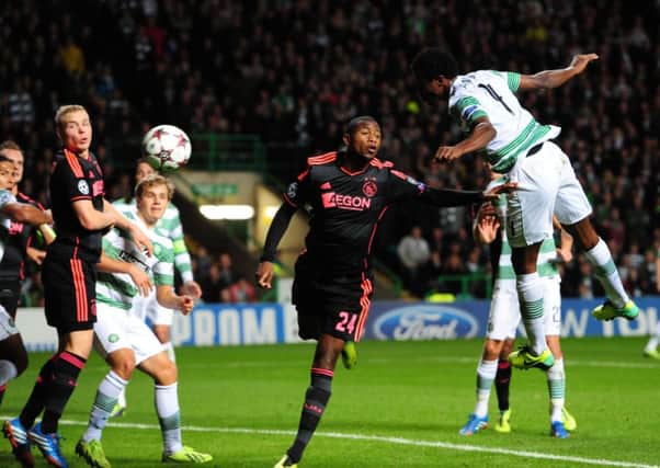 Celtic's Efe Ambrose heads for goal during the clash with Ajax in Glasgow. Picture: Ian Rutherford