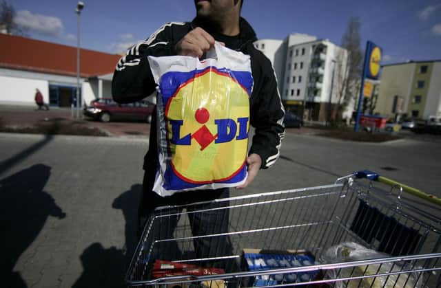 Aldi now commands a record 4 per cent share of the UK grocery market. Picture: Getty