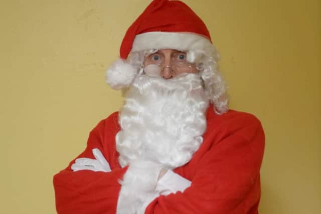 Actor Mike Daviot in his Santa costume. Picture: Hemedia