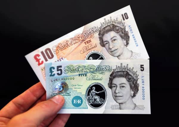 Five pound British polymer banknotes will be issued from 2016, the Bank of England announced. Picture: Getty