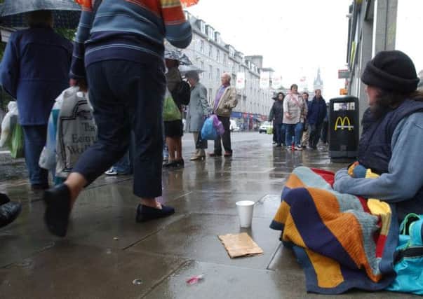 The Labour-led coalition is to make an application for street begging to be criminalised in the Granite City. Picture: Phil Wilkinson