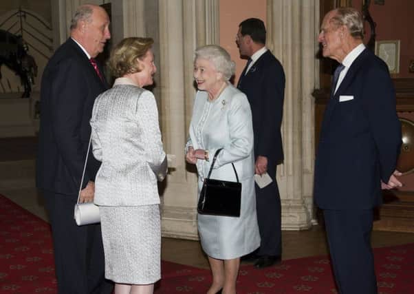 The Queen meets King Harald V and Queen Sonja of Norway, a democratic independent country. Picture: Getty