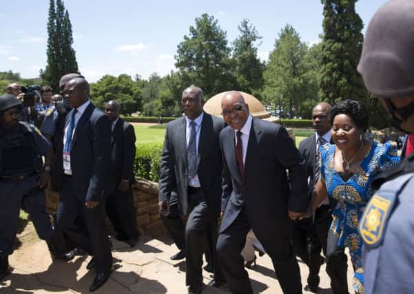 Jacob Zuma arrives to unveil a giant statue of former South African president Nelson Mandela in Pretoria. Picture: Getty