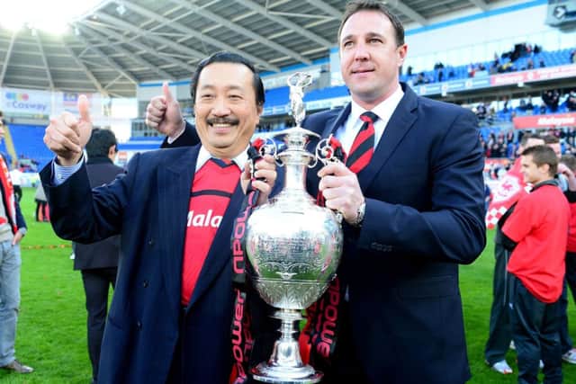 Cardiff owner Vincent Tan, left, has been unhappy with Malky Mackays duties as club manager. Picture: PA