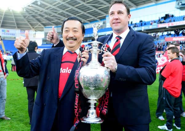 Cardiff owner Vincent Tan, left, has been unhappy with Malky Mackays duties as club manager. Picture: PA