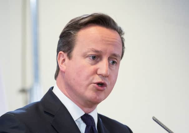 David Cameron speaking to press in Brussels yesterday. Picture: AP