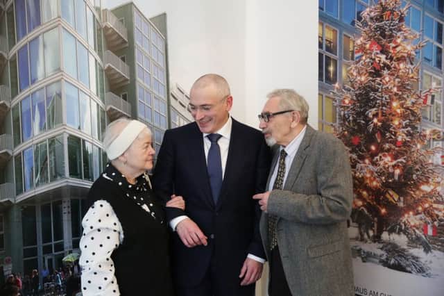 Mikhail Khodorkovsky with his mother Marina and father Boris, at the Wall Museum, Berlin. Picture: AP