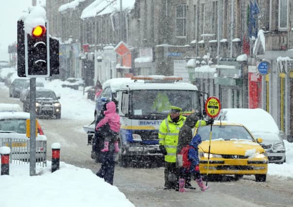 Schools should be more proactive in closing for bad weather, say the SSTA. Picture: TSPL