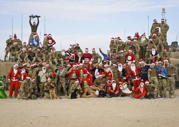Soldiers at Patrol Base Lash Durai  in Afghanistan get into the festive spirit. Pictures:  Ben Birchall/PA