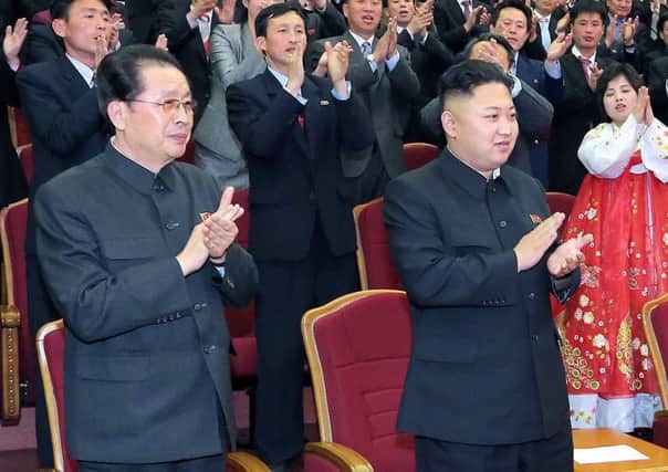 Kim Jong-un with his uncle Jang Sung-taek earlier this year. Picture: Getty