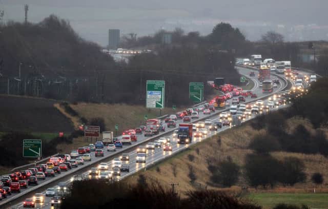 Traffic builds up on the Edinburgh City Bypass as people make their way home for Christmas. Picture: PA