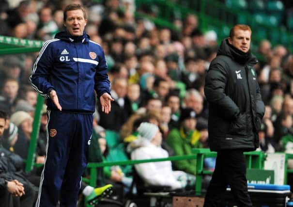 Gary Locke, left, adopted a more defensive approach against Celtic on Saturday. Picture: TSPL