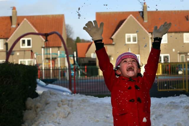 Chelsey-Lee Kirkton and family won a competition to have 10 tonnes of snow delivered. Picture: PA