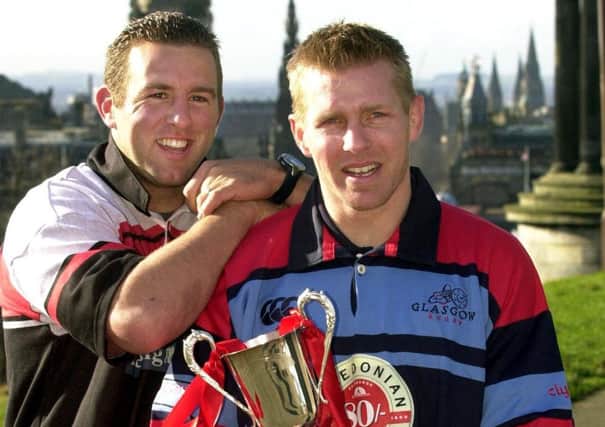 Brendan Laney, left, and Glenn Metcalfe promote the 2002 Inter-City Cup clash. Picture: Bill Henry