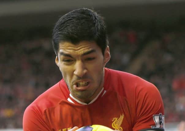 In-form Luis Suarez is a danger to Manchester City at the Etihad Stadium today. Picture: Reuters