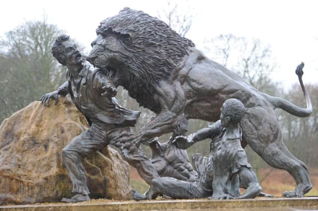 A statue of Livingstone being attacked by a lion at The David Livingstone Centre. Picture: Robert Perry