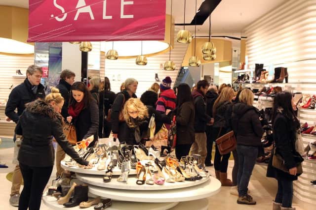 Hundreds of bargain hunters flood into Harvey Nichols in Edinburgh for the Boxing Day Sales. Picture: Hemedia