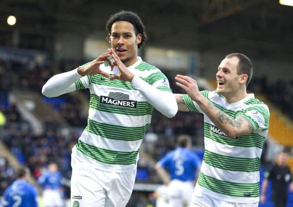 Virgil Van Dijk celebrates his early goal with team-mate Anthony Stokes. Picture: SNS