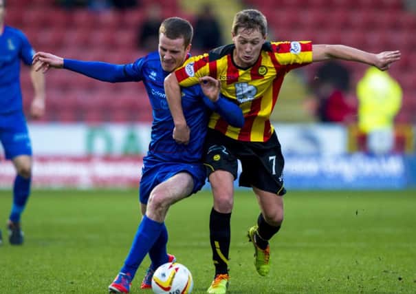 Inverness' Marley Watkins and James Craigen battle for the ball. Picture: SNS