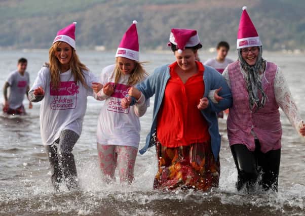 Lauren Mommer, 26, Nicole, Mommer, 22, Nicola Campbell, 26, and Andrea Hardy, 21. go for a dip in Lunderston Bay. Picture: Hemedia