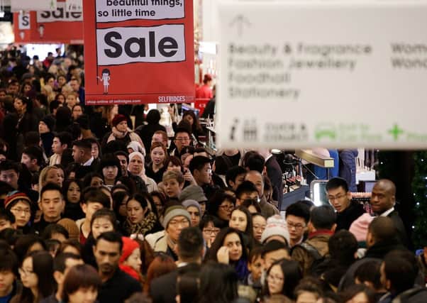 People crammed into shops for the Boxing Day sales. Picture: Getty