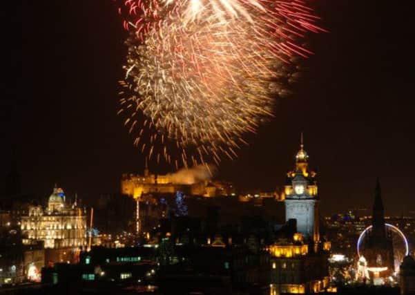 Fireworks over Edinburgh Castle as Hogmanay celebrations get underway. Picture: Julie Howden