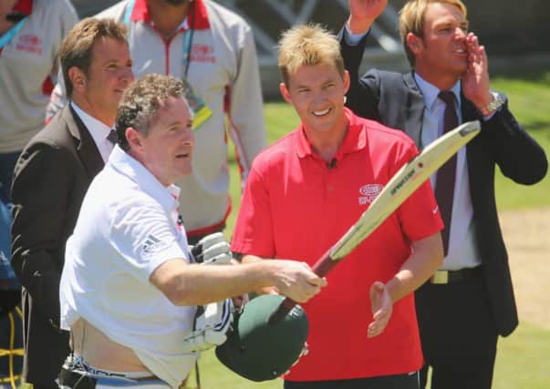 Piers Morgan salutes the crowd after facing deliveries from former Australian cricketer Brett Lee. Picture: Getty