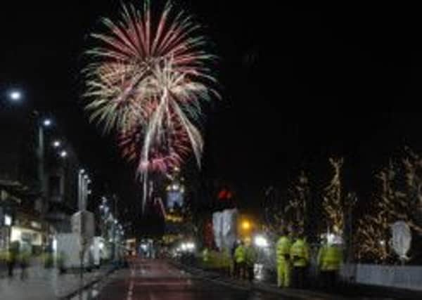 Fireworks explode from Calton Hill, as seen from the cancelled street party of 2006. Picture: TSPL