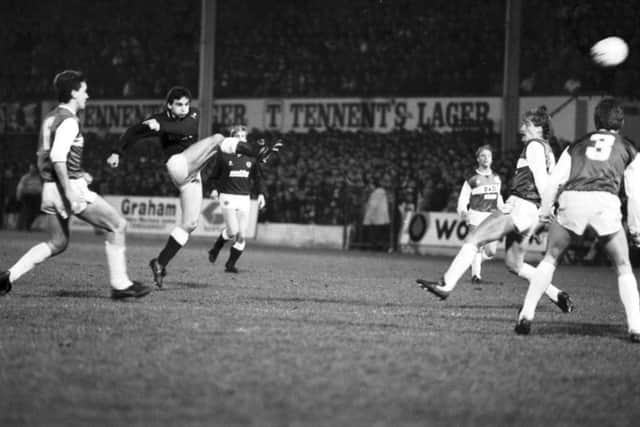 John Colquhoun scores Hearts' second goal during the Hibs v Hearts derby in January 1987. Picture: TSPL