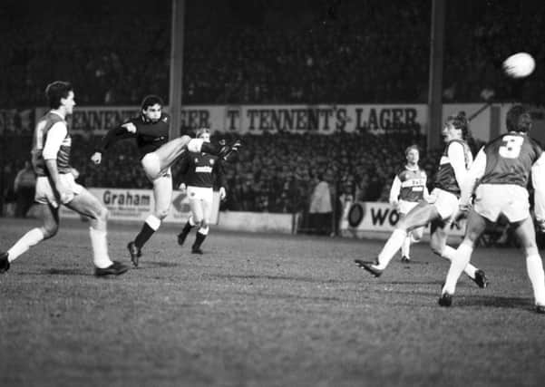 John Colquhoun scores Hearts' second goal during the Hibs v Hearts derby in January 1987. Picture: TSPL