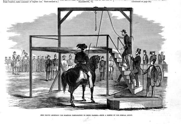 John Brown climbs the scaffolding ahead of his execution in 1859