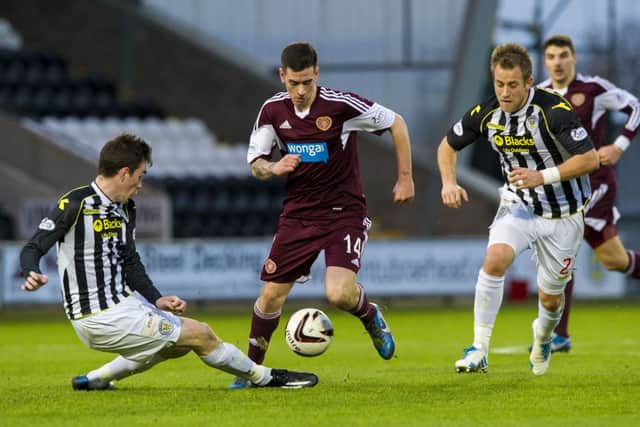 Jamie Walker's is challenged by St Mirren's Sean Kelly (left) and Danny Granger. Picture: SNS