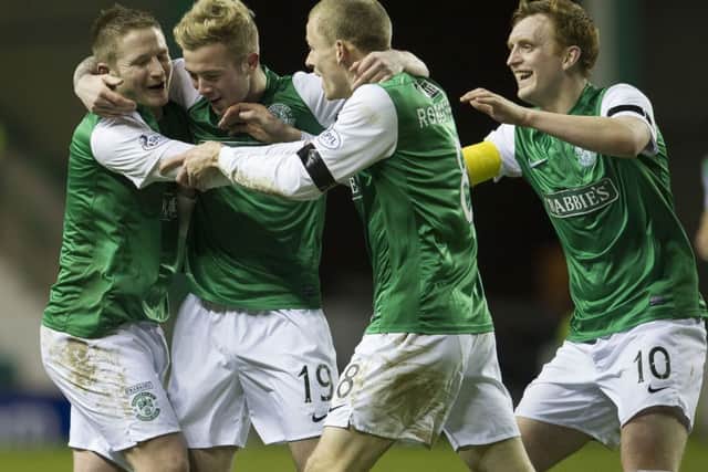 Paul Cairney (left) is congratulated after scoring Hibernian's second goal of the match. Picture: SNS