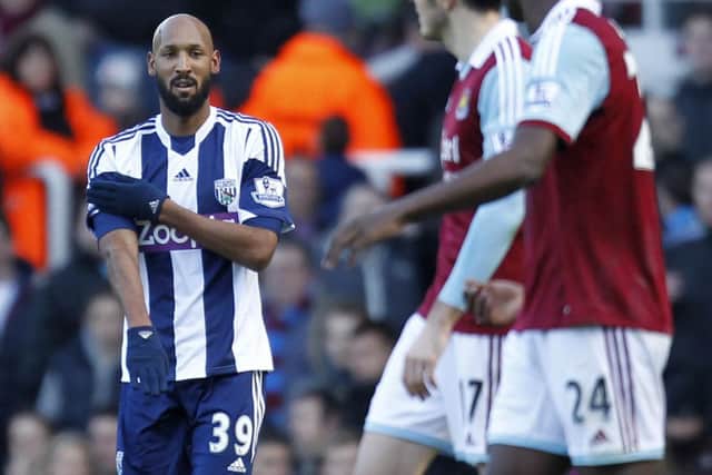 Anelka gestures as he celebrates scoring for West Ham. Picture: Getty