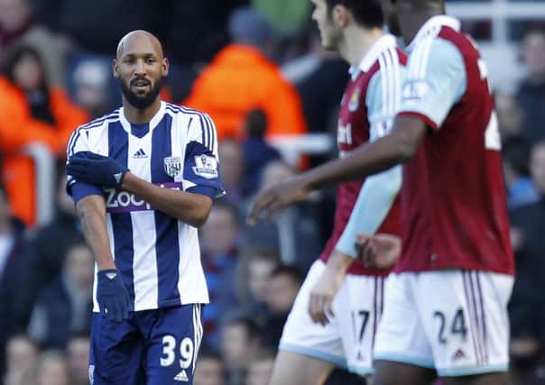 Anelka gestures as he celebrates scoring for West Ham. Picture: Getty