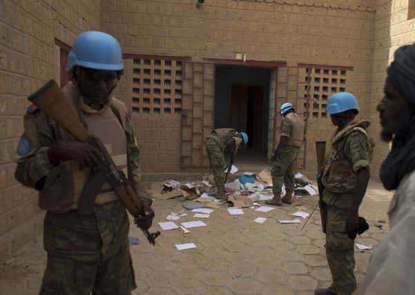 UN peacekeepers search a suspected al-Qaida base in Timbuktu, Mali. Picture: AP