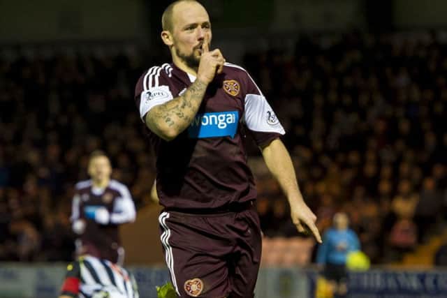 Jamie Hamill celebrates after scoring an equaliser for Hearts against St Mirren. Picture: SNS