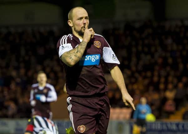 Jamie Hamill celebrates after scoring an equaliser for Hearts against St Mirren. Picture: SNS