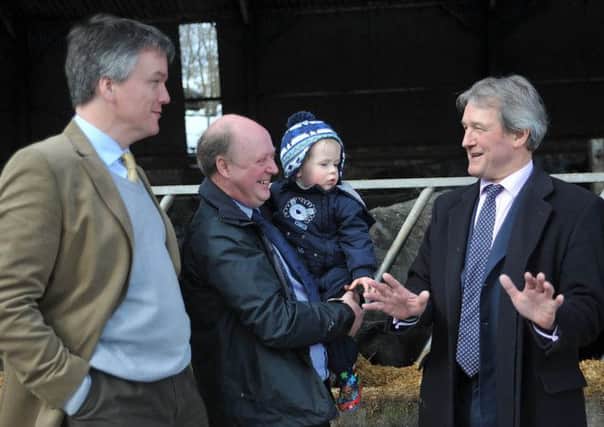 Nigel Miller, pictured with Michael Moore and Owen Paterson. Picture: Johnston Press
